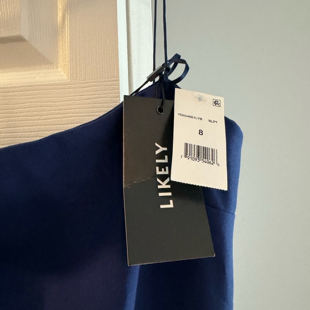 LIKELY navy blue gown, unworn